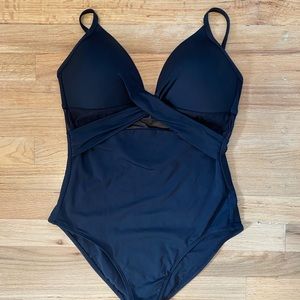 Liz Claiborne women’s black one piece bathing suit.